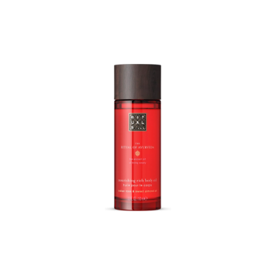 Rituals The Ritual of Ayurveda Nourishing Rich Body Oil 100ml red bottle with dark wood effect cap on white background